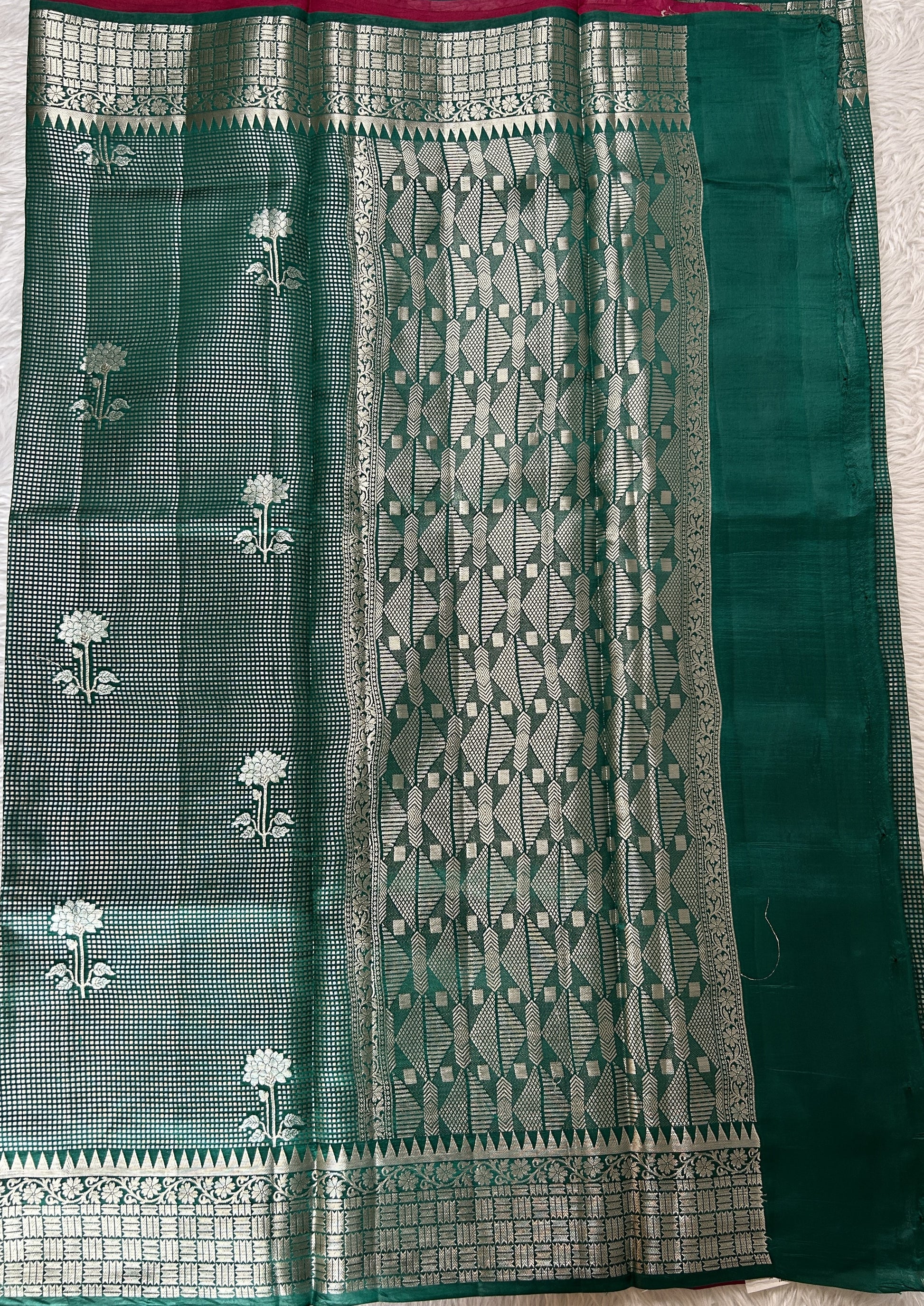 Banarasi Chiniya Silk Saree Bottle Green Colored Complemented with a Zari Border. - Sampradaya Designer Studio