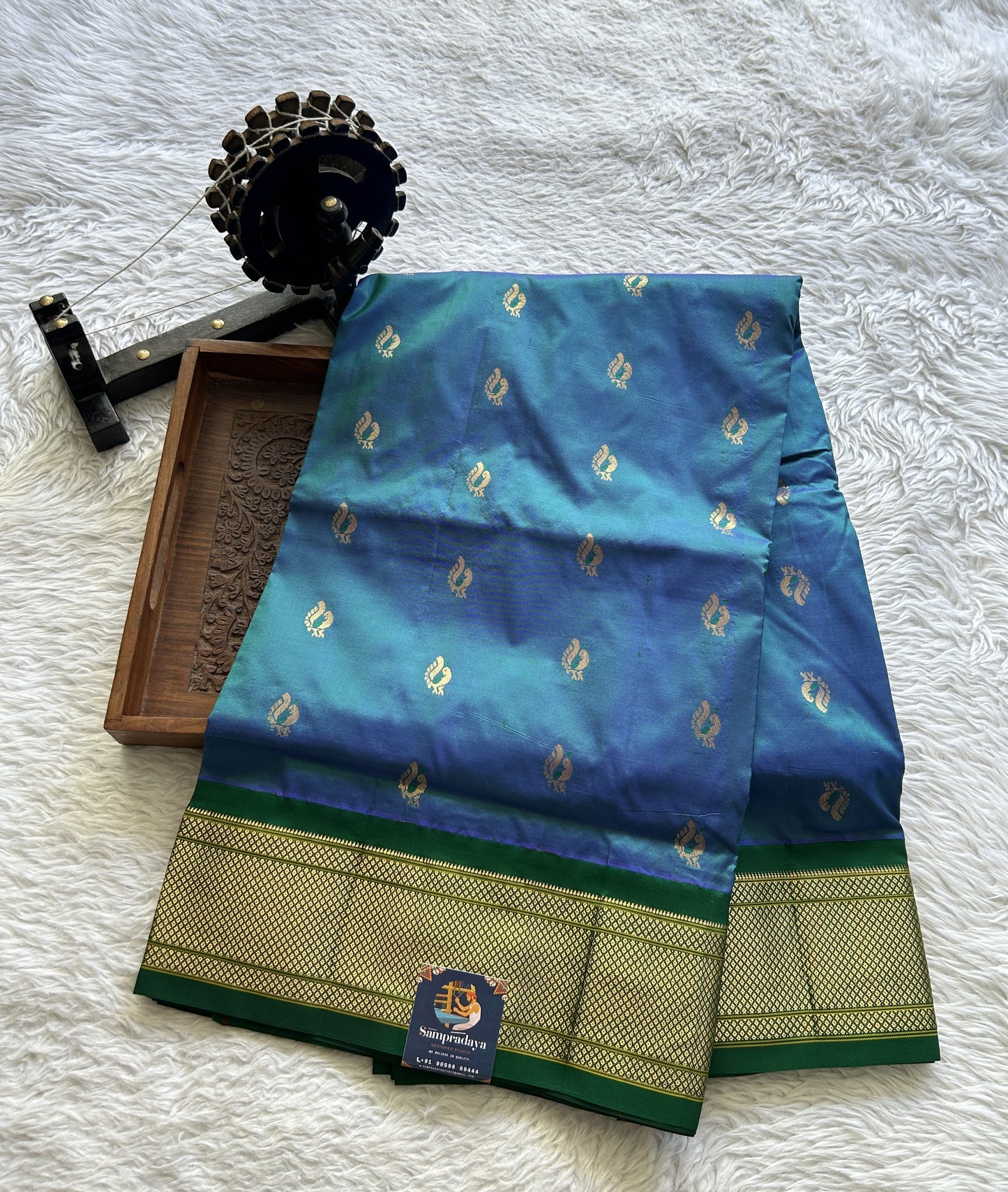 Narayanpet Silk Saree Peacock Blue Colored Complemented with a Green Zari Border.