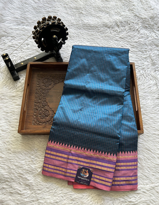 Narayanpet Silk Checks Saree Peacock Blue Colored Complemented with a Peach Zari Border.