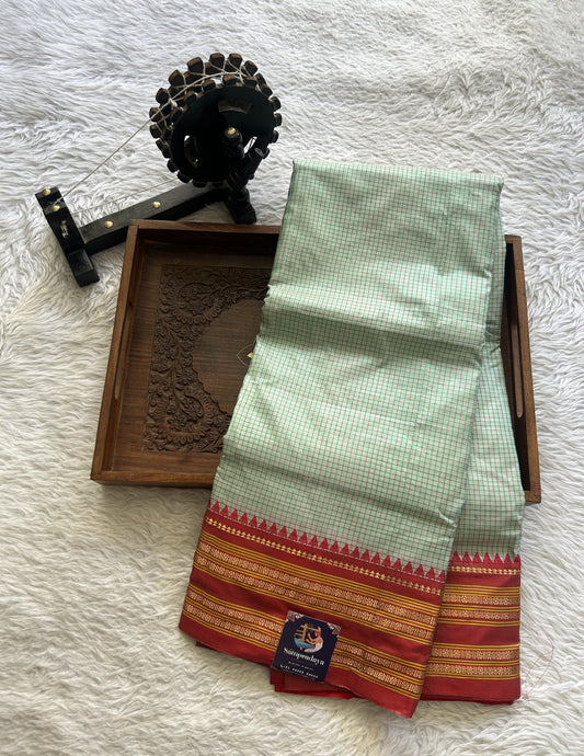 Narayanpet Silk Checks Saree Sea Green Colored Complemented with a Red Zari Border.