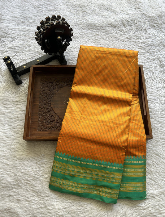 Narayanpet Silk Checks Saree Orange Colored Complemented with a Rama Green Zari Border.