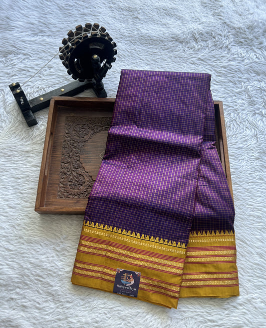 Narayanpet Silk Checks Saree Purple Colored Complemented with a Yellow Zari Border.