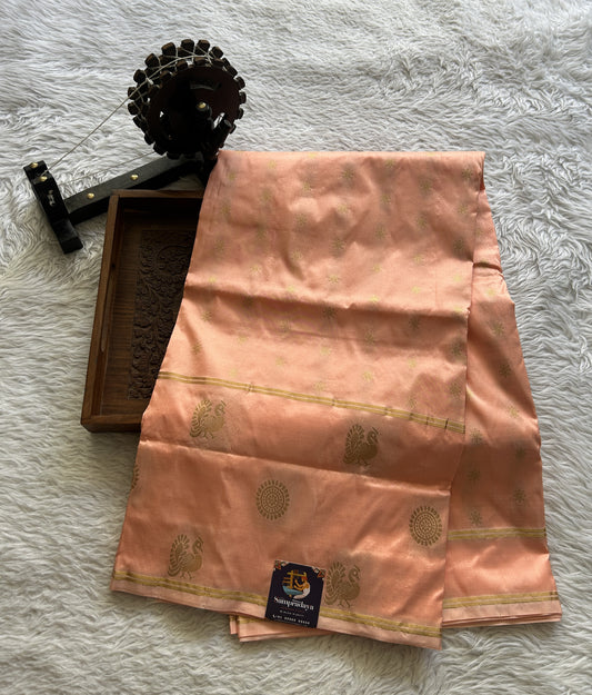 Narayanpet Silk Saree Peach Colored Complemented with a Buti Border.