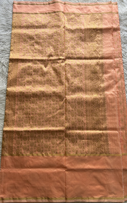 Narayanpet Silk Saree Peach Colored Complemented with a Buti Border.