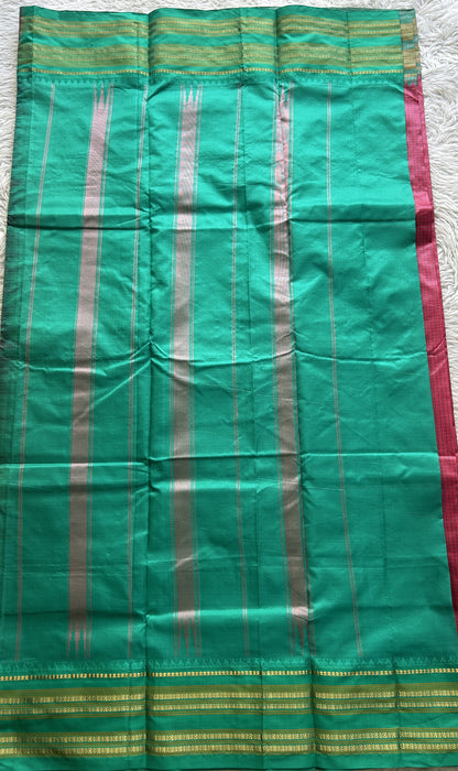 Narayanpet Silk Checks Saree Pink Colored Complemented with a Rama Green Zari Border.