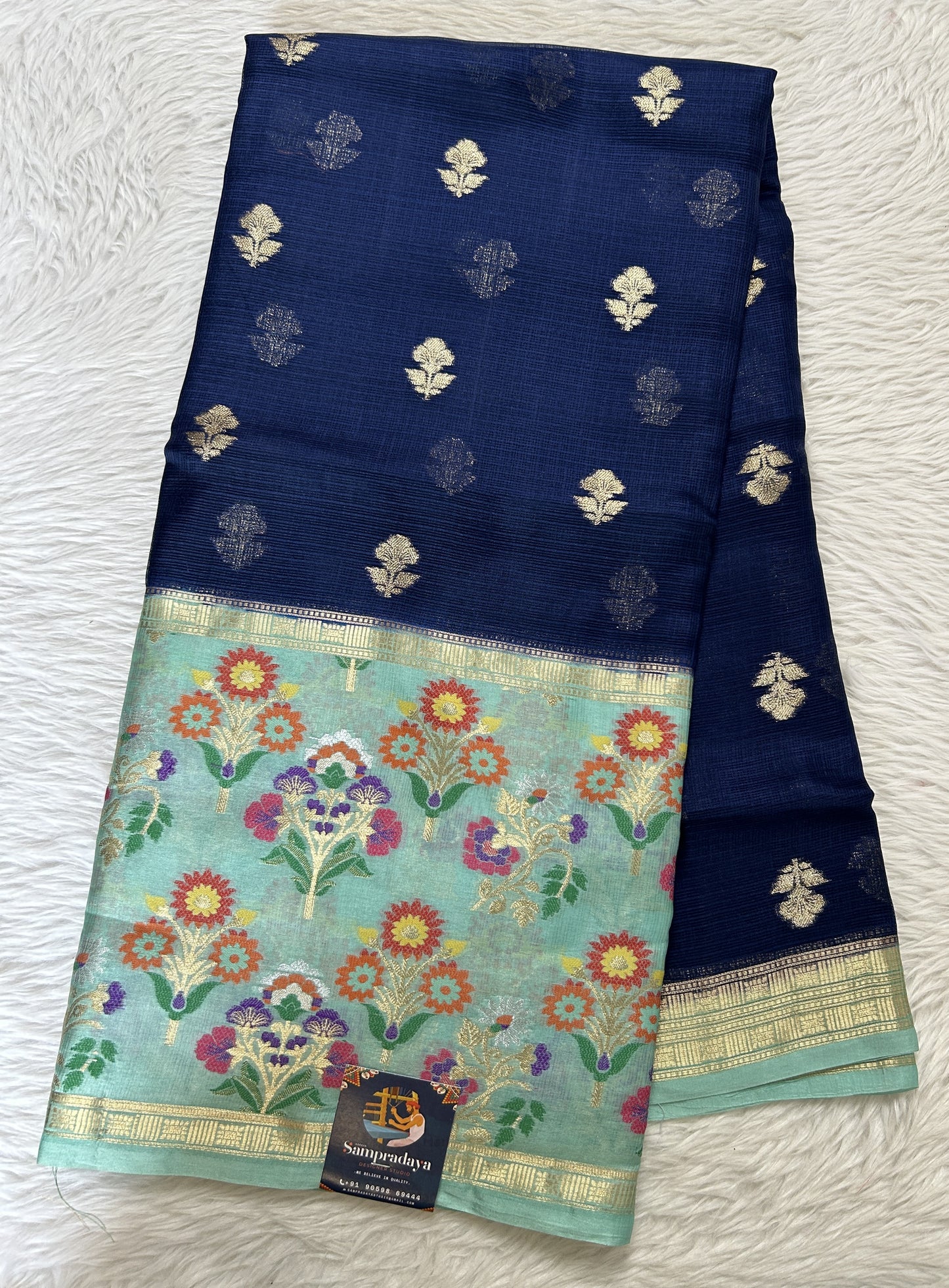 Silk kota Saree Navy Blue colored Complemented with a Sea Blue Color Zari Buti Border. - Sampradaya Designer Studio