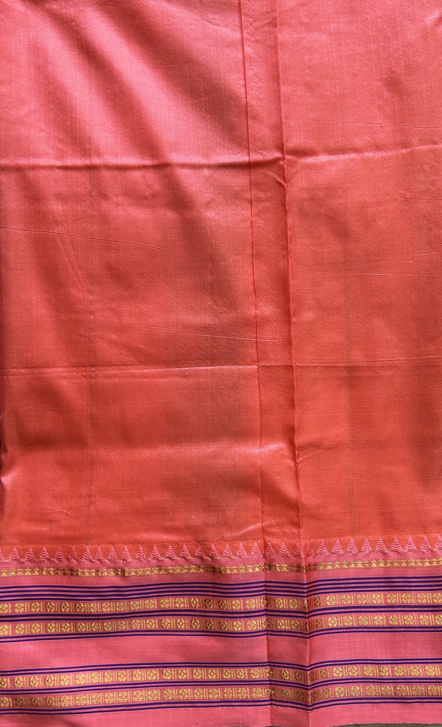 Narayanpet Silk Checks Saree Black Colored Complemented with a Peach Zari Border.