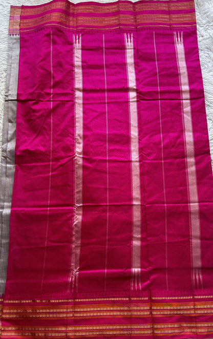 Narayanpet Silk Checks Saree Ash Colored Complemented with a Pink Zari Border.