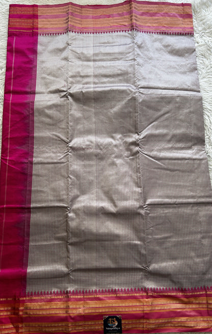 Narayanpet Silk Checks Saree Ash Colored Complemented with a Pink Zari Border.