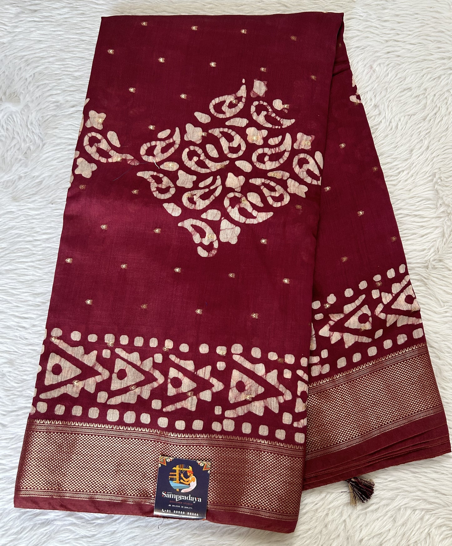 Banarasi Cotton Saree Magenta Colored Complemented with a Zari Border. - Sampradaya Designer Studio