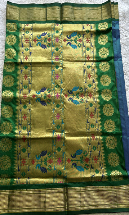 Narayanpet Silk Saree Peacock Blue Colored Complemented with a Green Zari Border.