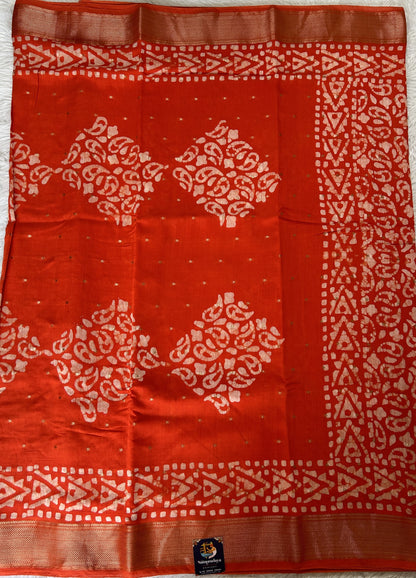 Banarasi Cotton Saree Orange Colored Complemented with a Zari Border. - Sampradaya Designer Studio