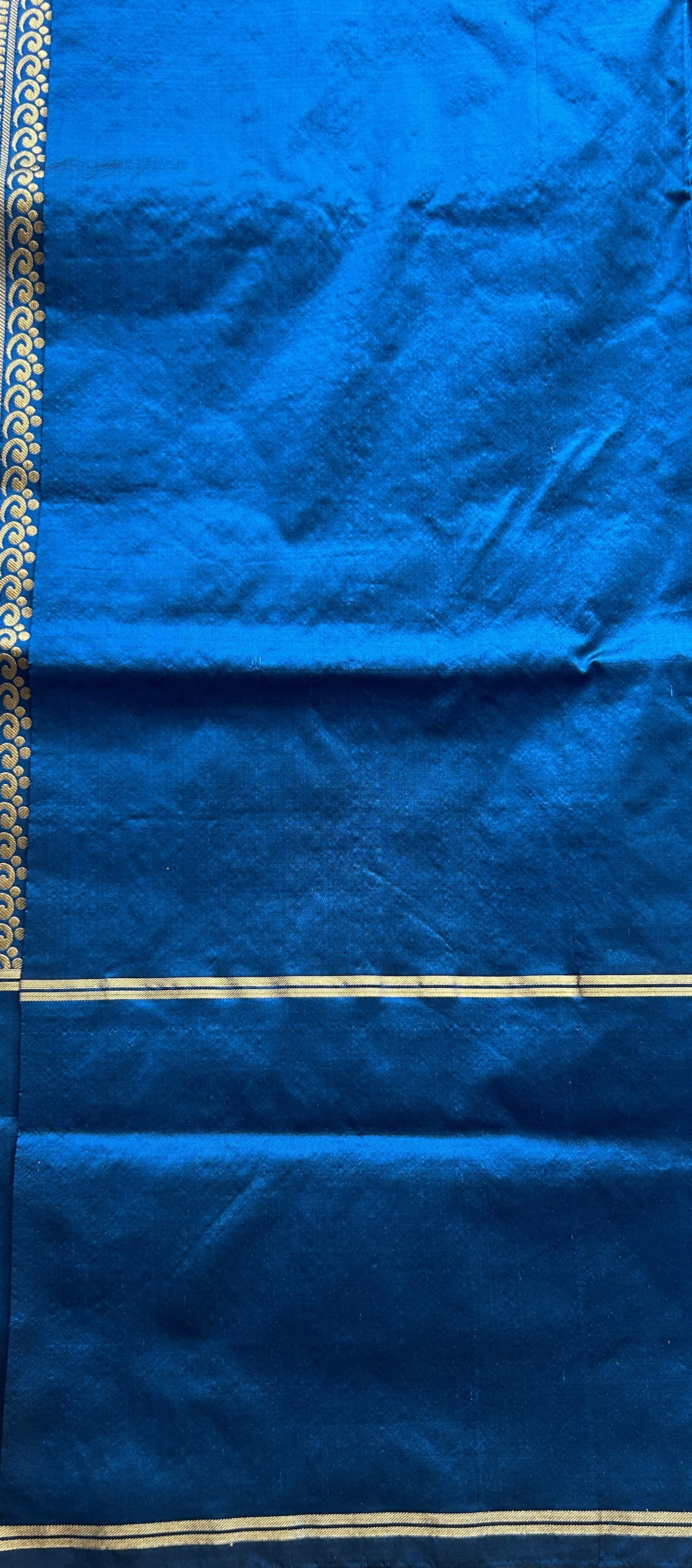 Narayanpet Silk Saree Peacock Blue Colored Complemented with a Buti Border.