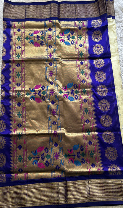 Narayanpet Silk Saree White Colored Complemented with a Zari Border.