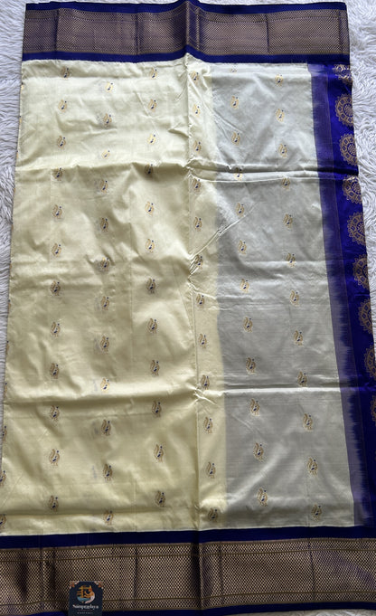 Narayanpet Silk Saree White Colored Complemented with a Zari Border.