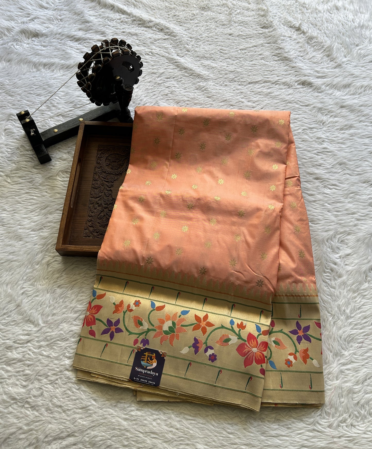 Narayanpet Silk Saree Peach Colored Complemented with a Paithani Border.