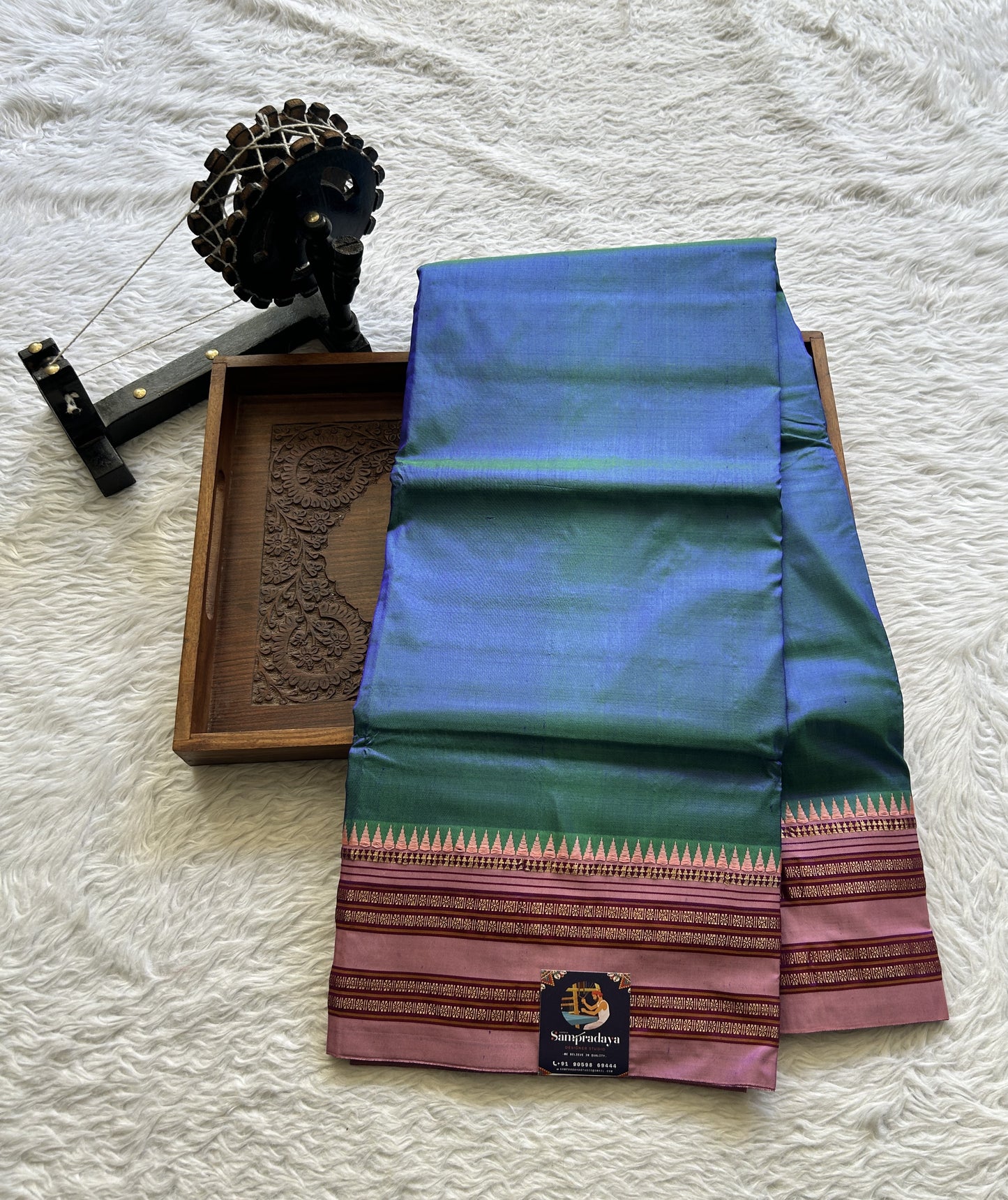 Narayanpet Silk Saree Peacock Blue Colored Complemented with a Baby Pink Zari Border.