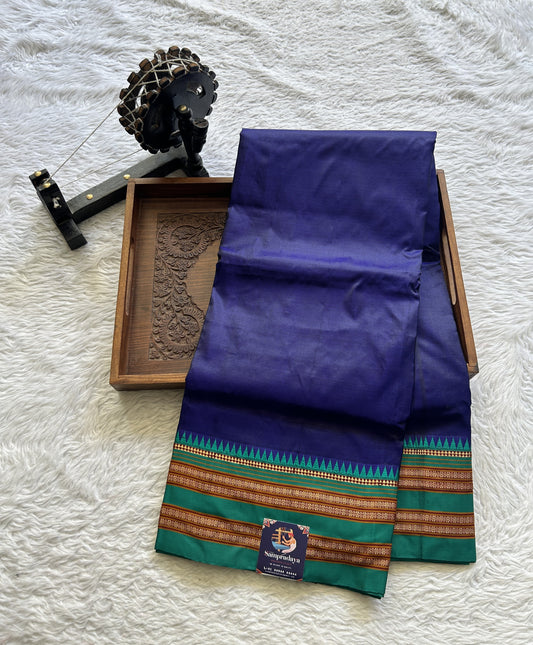 Narayanpet Silk Saree Navy Blue Colored Complemented with a Zari Border.