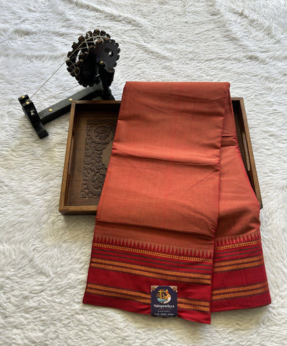 Narayanpet Cotton Saree Rust Colored Complemented with a Thread Border.