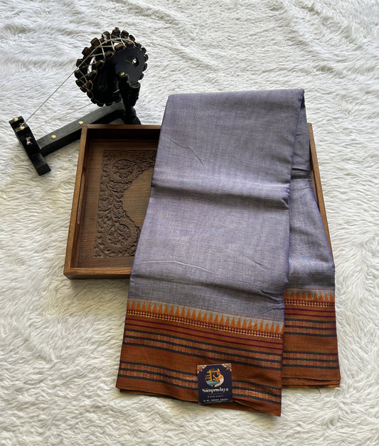 Narayanpet Cotton Saree Dark Lavender Colored Complemented with a Thread Border.