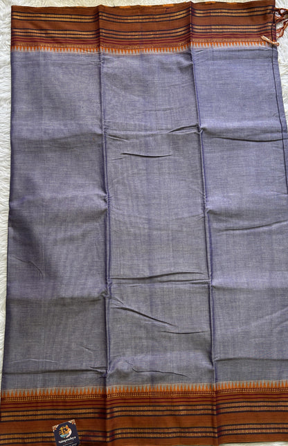 Narayanpet Cotton Saree Dark Lavender Colored Complemented with a Thread Border.