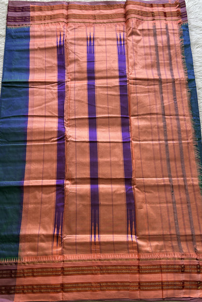 Narayanpet Silk Saree Peacock Blue Colored Complemented with a Baby Pink Zari Border.