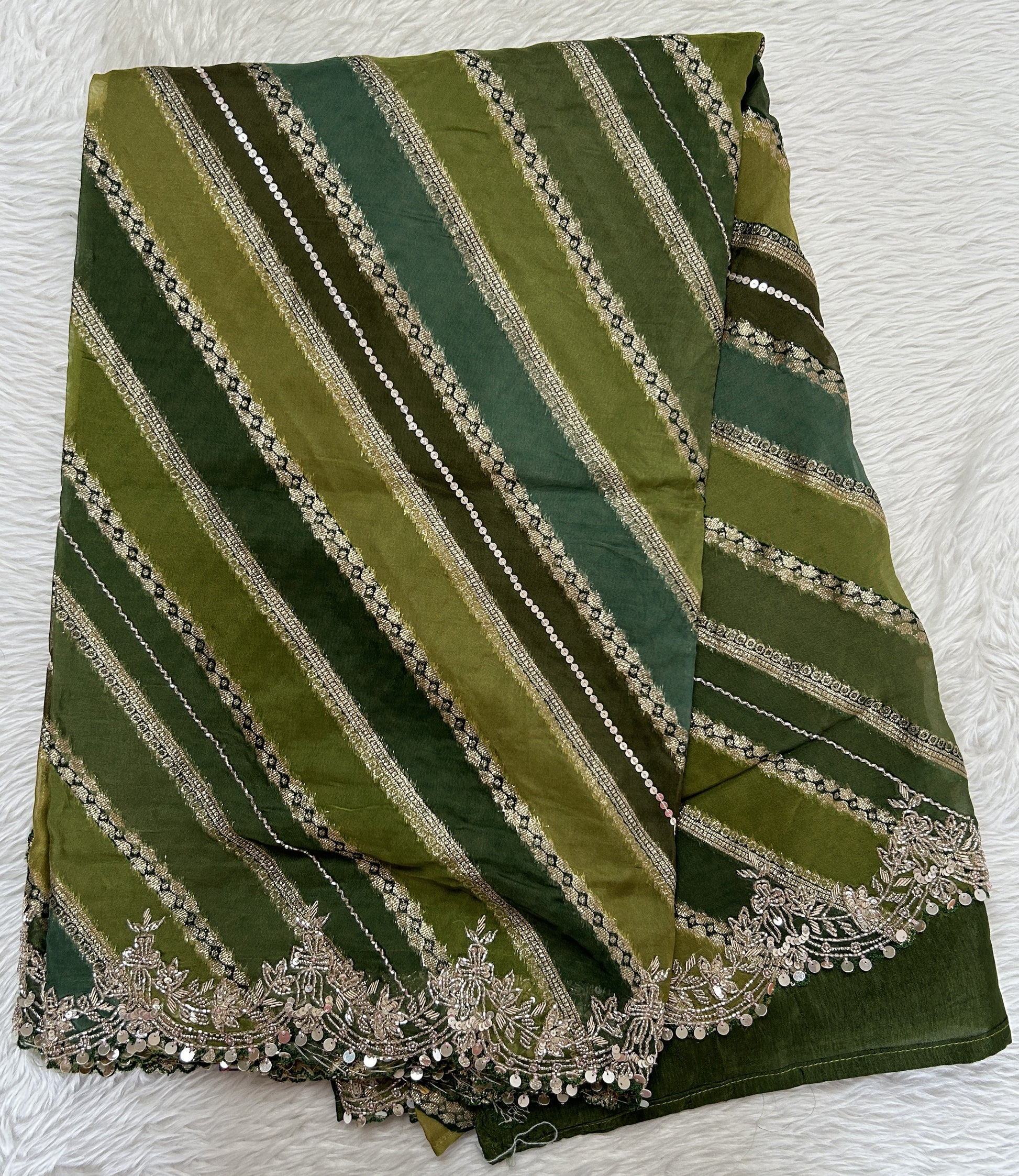 Banarasi Georgette Saree Green Colored Complemented with a Hand Embroidery border. - Sampradaya Designer Studio