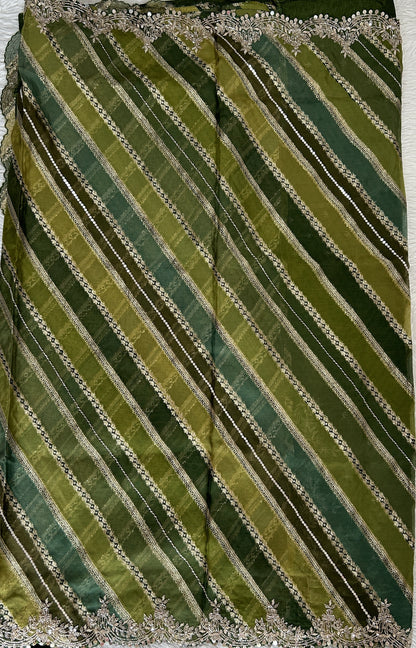 Banarasi Georgette Saree Green Colored Complemented with a Hand Embroidery border. - Sampradaya Designer Studio