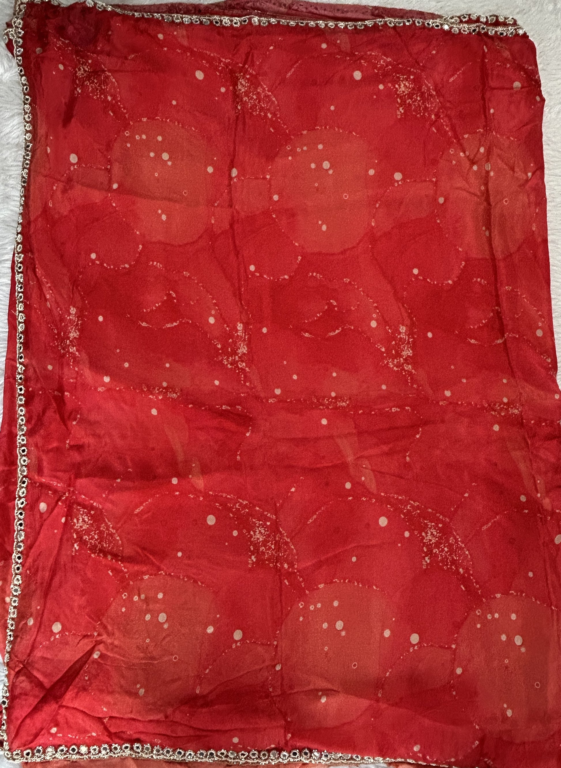 Chiffon Designer Saree Red Color complemented with a Hand Embroidery Border. - Sampradaya Designer Studio