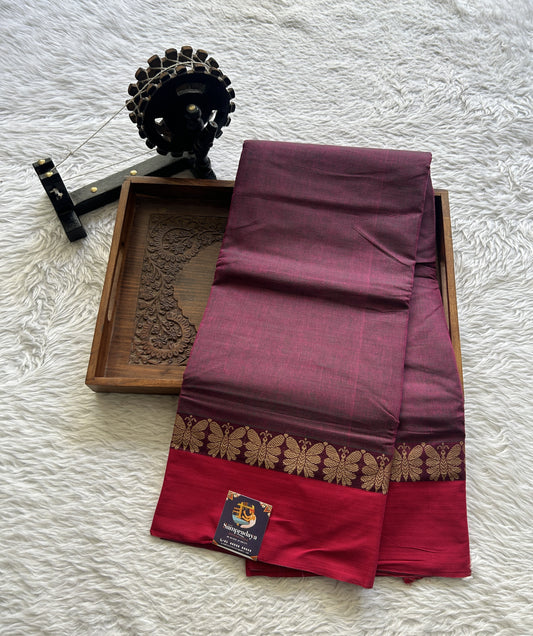 Narayanpet Cotton Saree Wine Colored Complemented with a Thread Border.