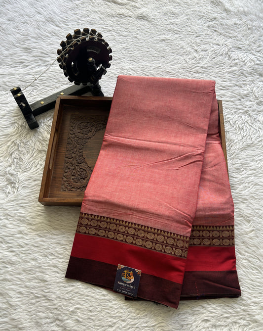 Narayanpet Cotton Saree Dark Coral Colored Complemented with a Thread Border.