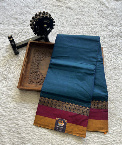 Narayanpet Cotton Saree Peacock Blue Colored Complemented with a Gap Border.