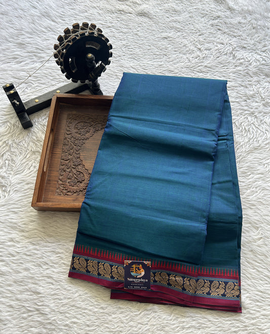 Narayanpet Cotton Saree Peacock Blue Colored Complemented with a Thread Border.