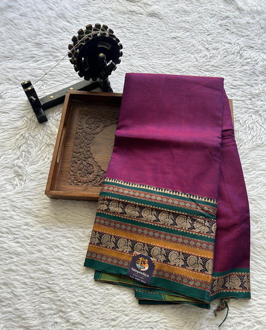 Narayanpet Cotton Saree Magenta Colored Complemented with a Thread Border.