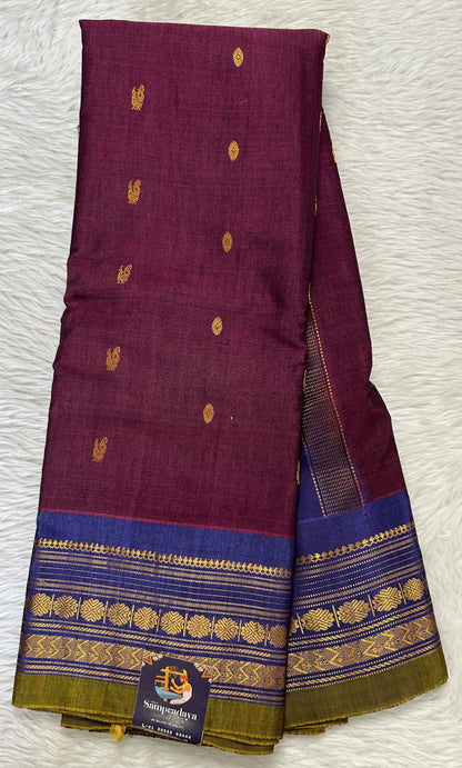 Gadwal Sico Saree Burgundy colored complemented with a Ink Blue Kanchi Gap Border. - Sampradaya Designer Studio