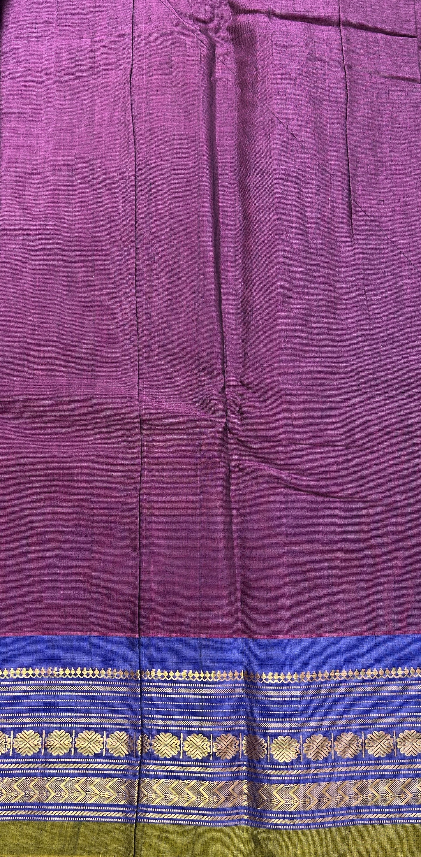 Gadwal Sico Saree Burgundy colored complemented with a Ink Blue Kanchi Gap Border. - Sampradaya Designer Studio