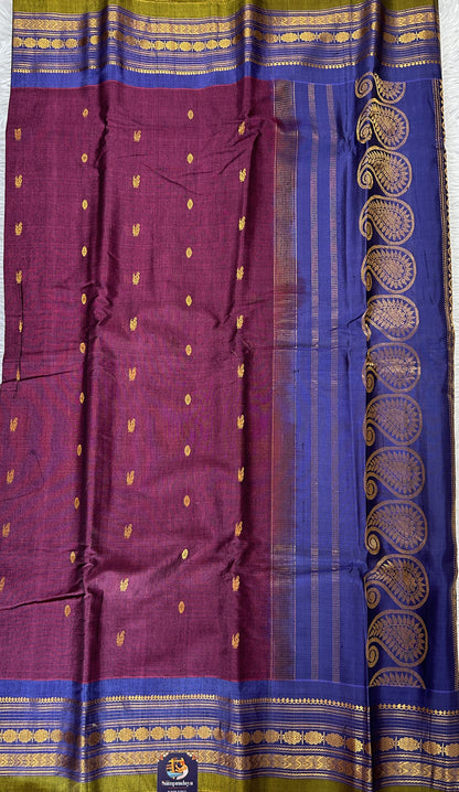 Gadwal Sico Saree Burgundy colored complemented with a Ink Blue Kanchi Gap Border. - Sampradaya Designer Studio