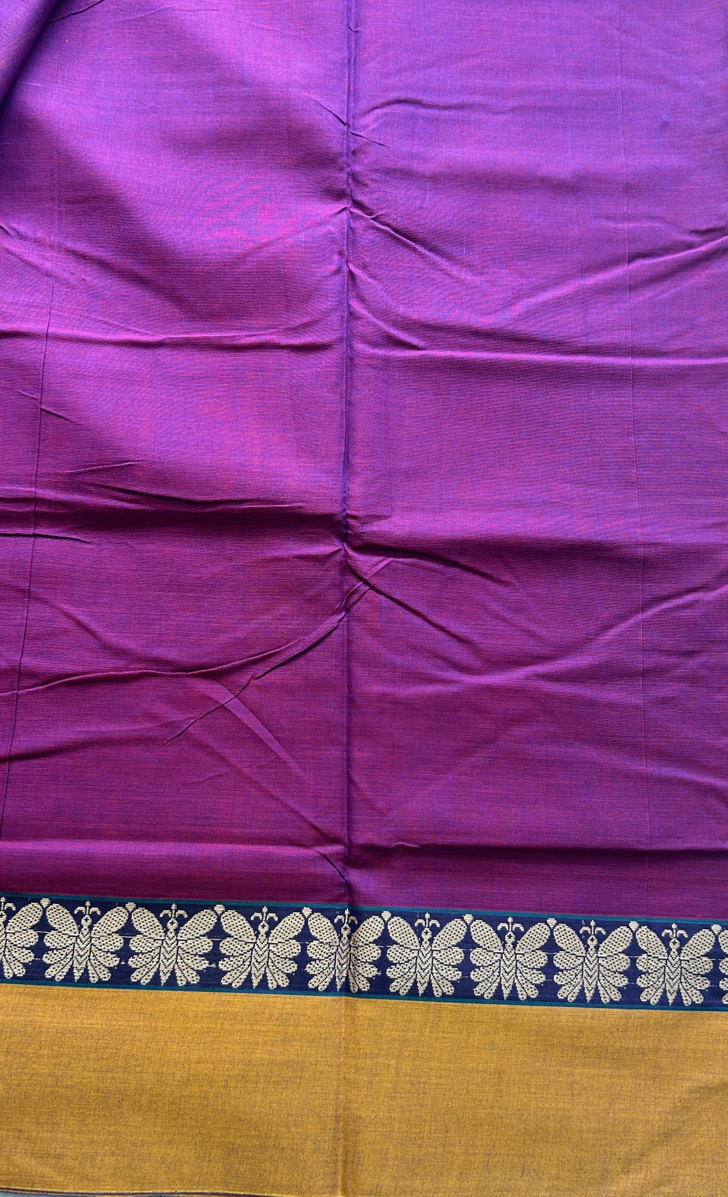 Narayanpet Cotton Saree Purple Colored Complemented with a Plain Border.