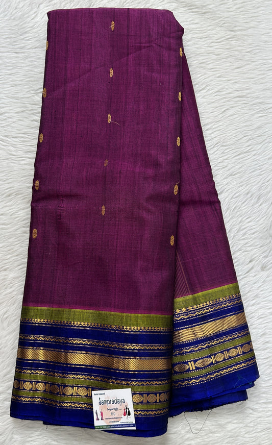 Gadwal Sico Saree Magenta colored complemented with a Ink Blue Kanchi Gap Border. - Sampradaya Designer Studio