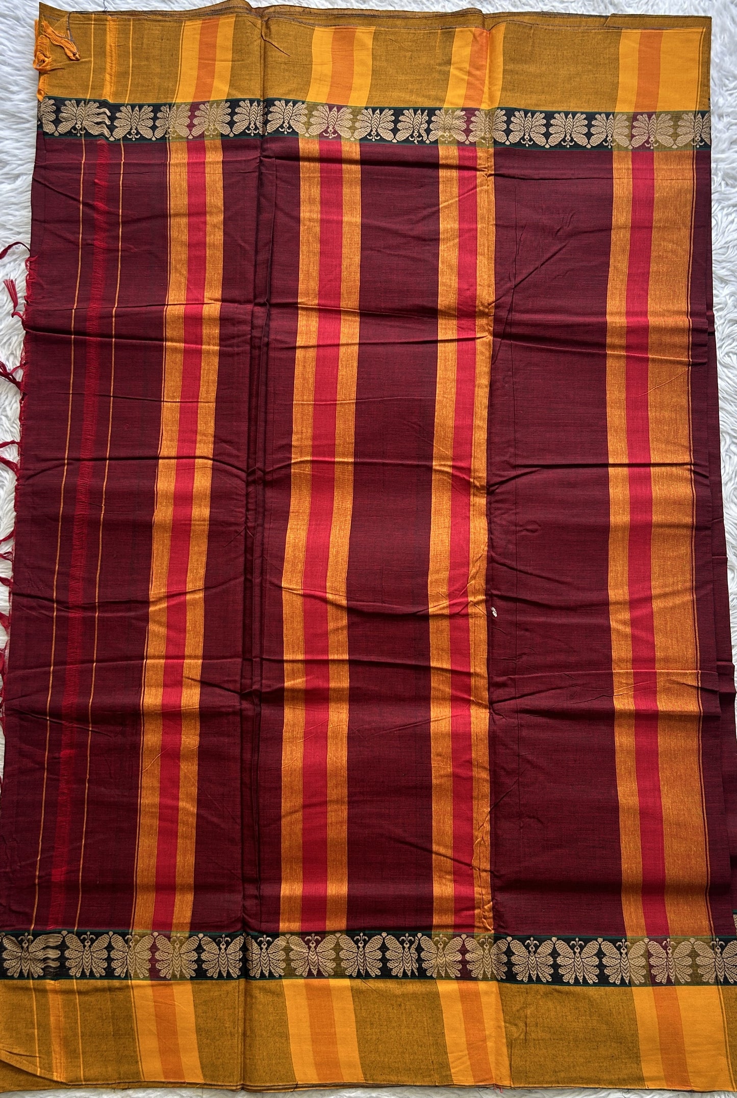 Narayanpet Cotton Saree Maroon Colored Complemented with a Thread Border.