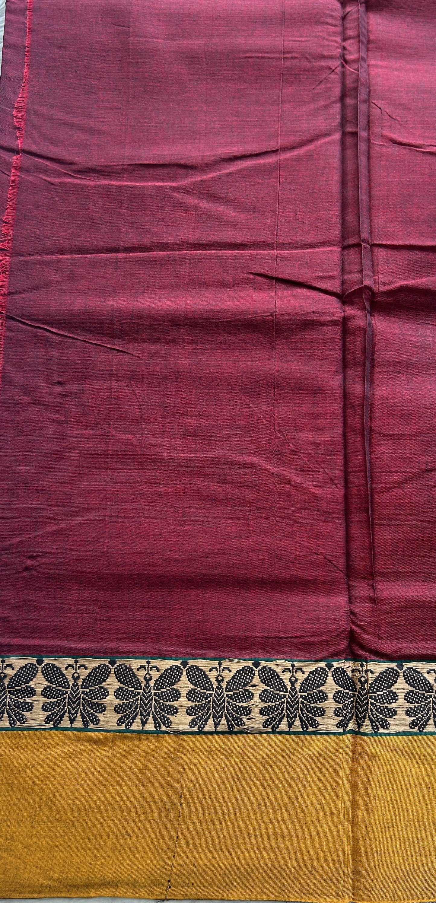 Narayanpet Cotton Saree Maroon Colored Complemented with a Thread Border.