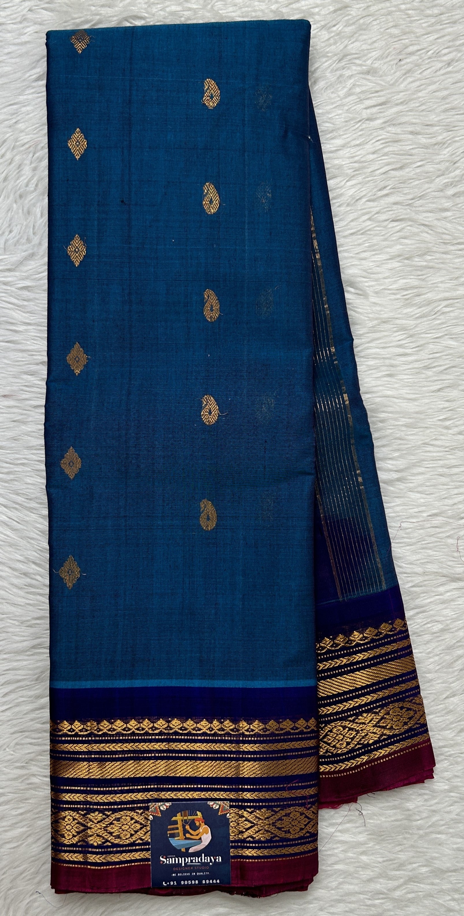 Gadwal Sico Saree Blue colored complemented with a Ink Blue Kanchi Border. - Sampradaya Designer Studio