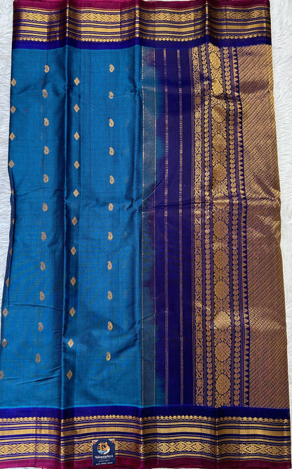 Gadwal Sico Saree Blue colored complemented with a Ink Blue Kanchi Border. - Sampradaya Designer Studio