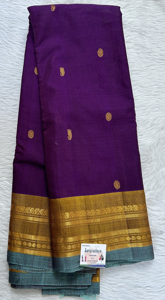 Gadwal Sico Saree Purple colored complemented with a Mustard Yellow Kanchi Border. - Sampradaya Designer Studio