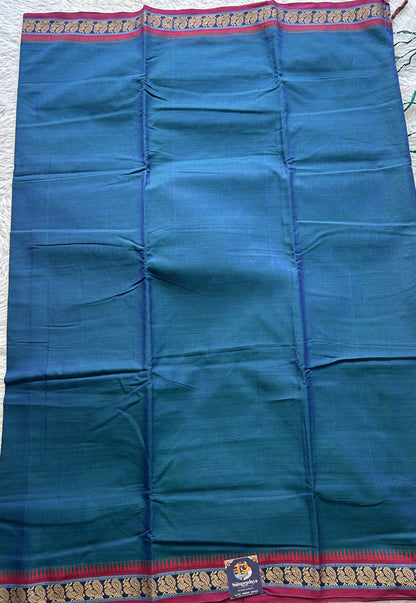 Narayanpet Cotton Saree Peacock Blue Colored Complemented with a Thread Border.