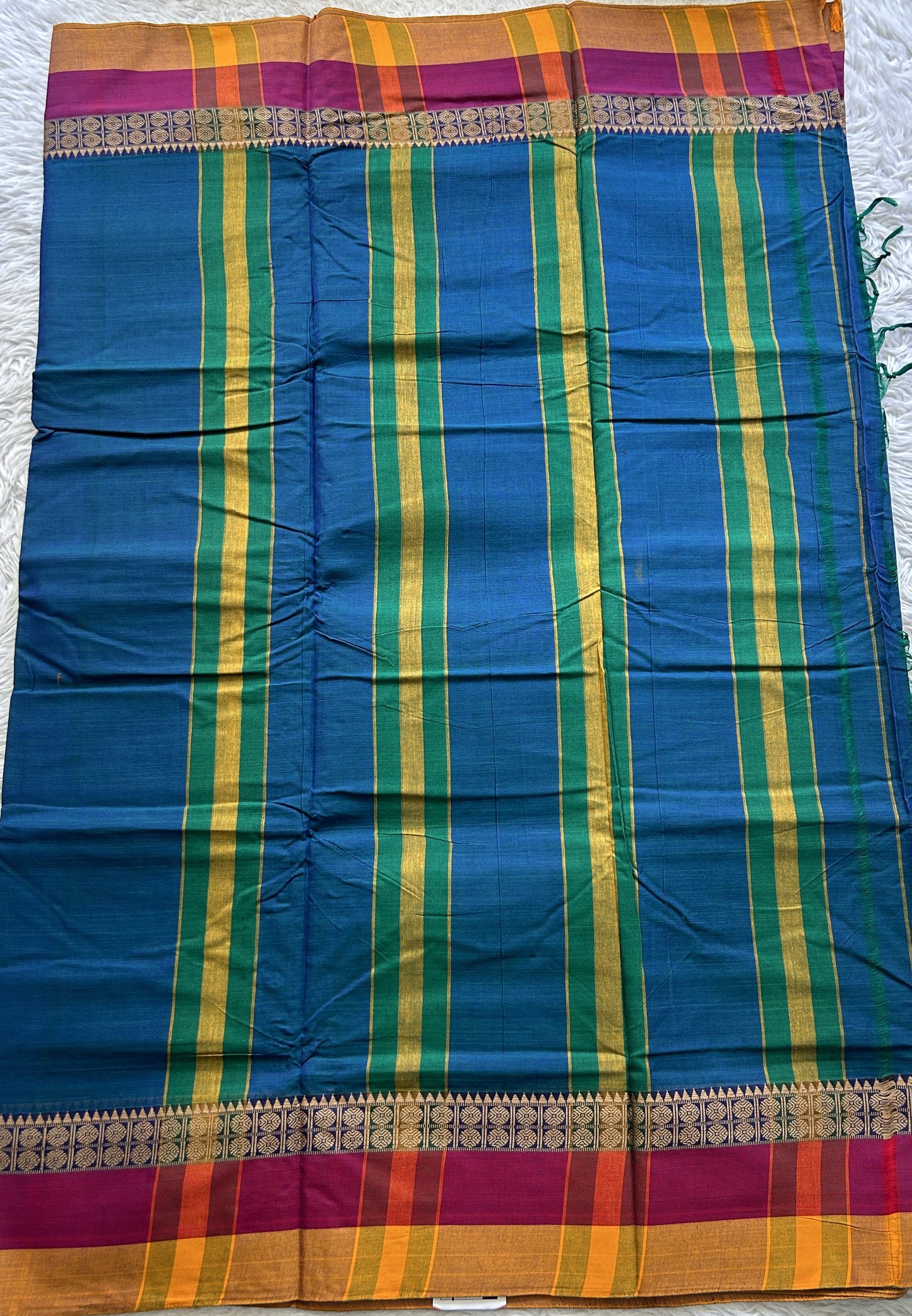 Narayanpet Cotton Saree Peacock Blue Colored Complemented with a Gap Border.