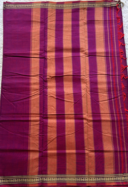 Narayanpet Cotton Saree Dark Purple Colored Complemented with a Thread Border.