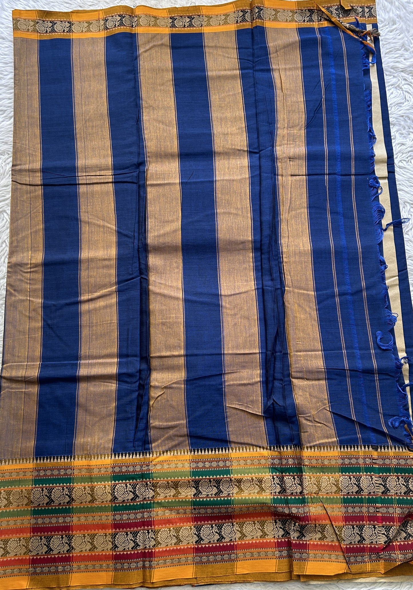 Narayanpet Cotton Saree Carbon Blue Colored Complemented with a Thread Border.