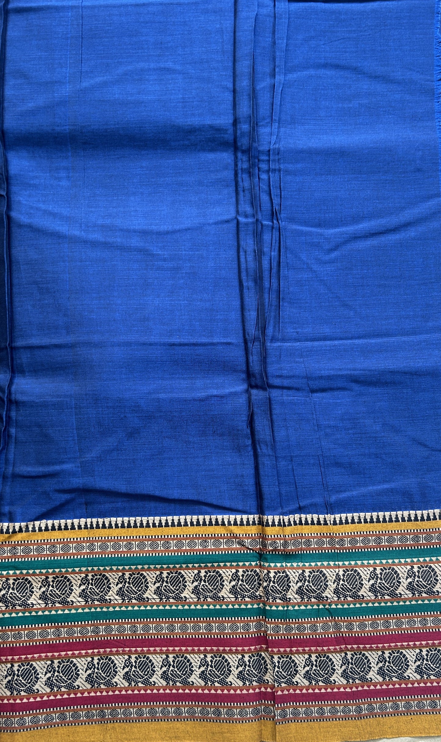 Narayanpet Cotton Saree Carbon Blue Colored Complemented with a Thread Border.