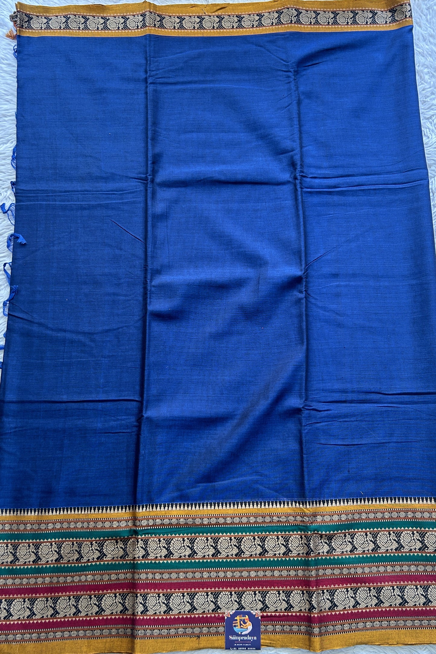 Narayanpet Cotton Saree Carbon Blue Colored Complemented with a Thread Border.